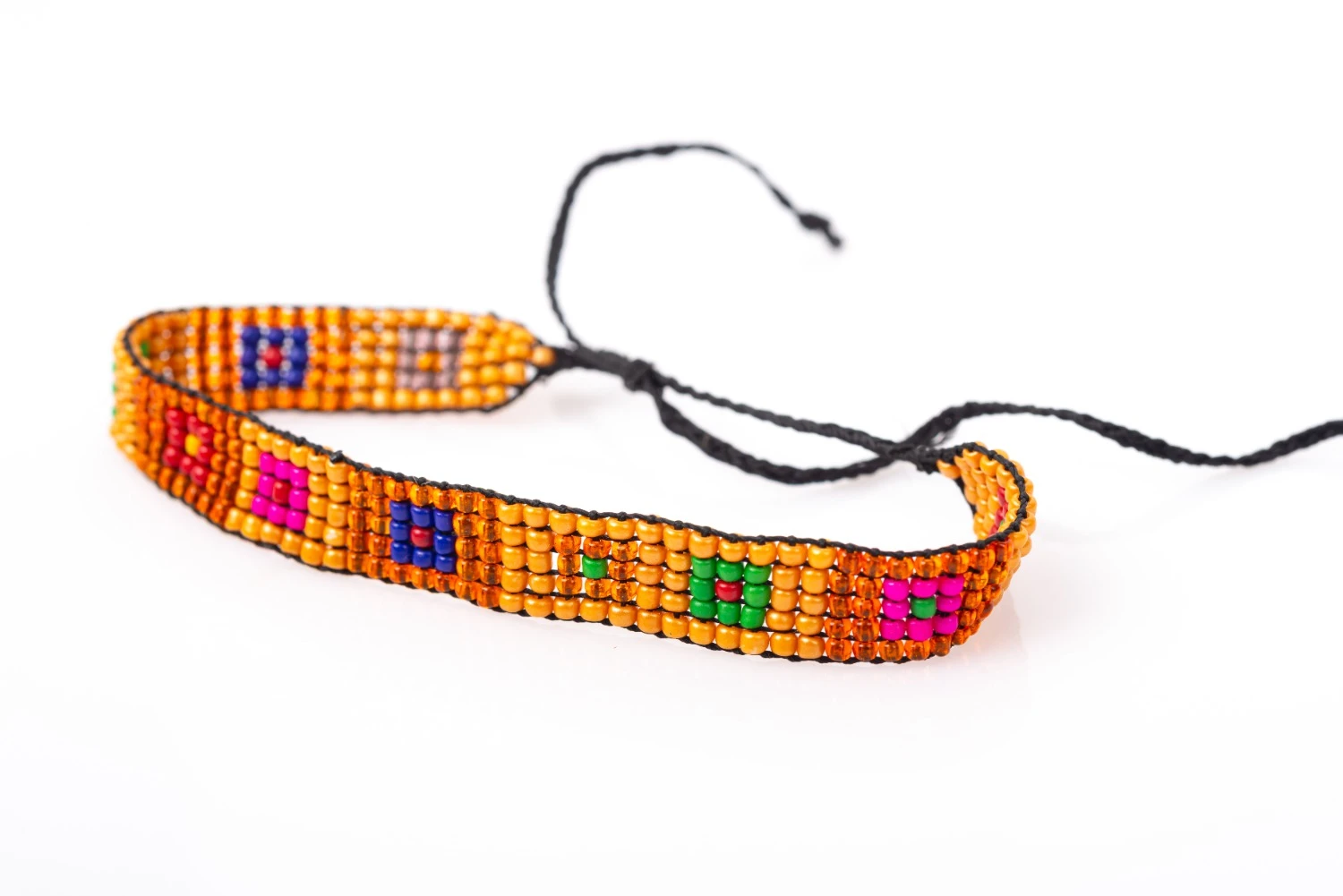 Small brown beaded bracelet with honey blue embroidery