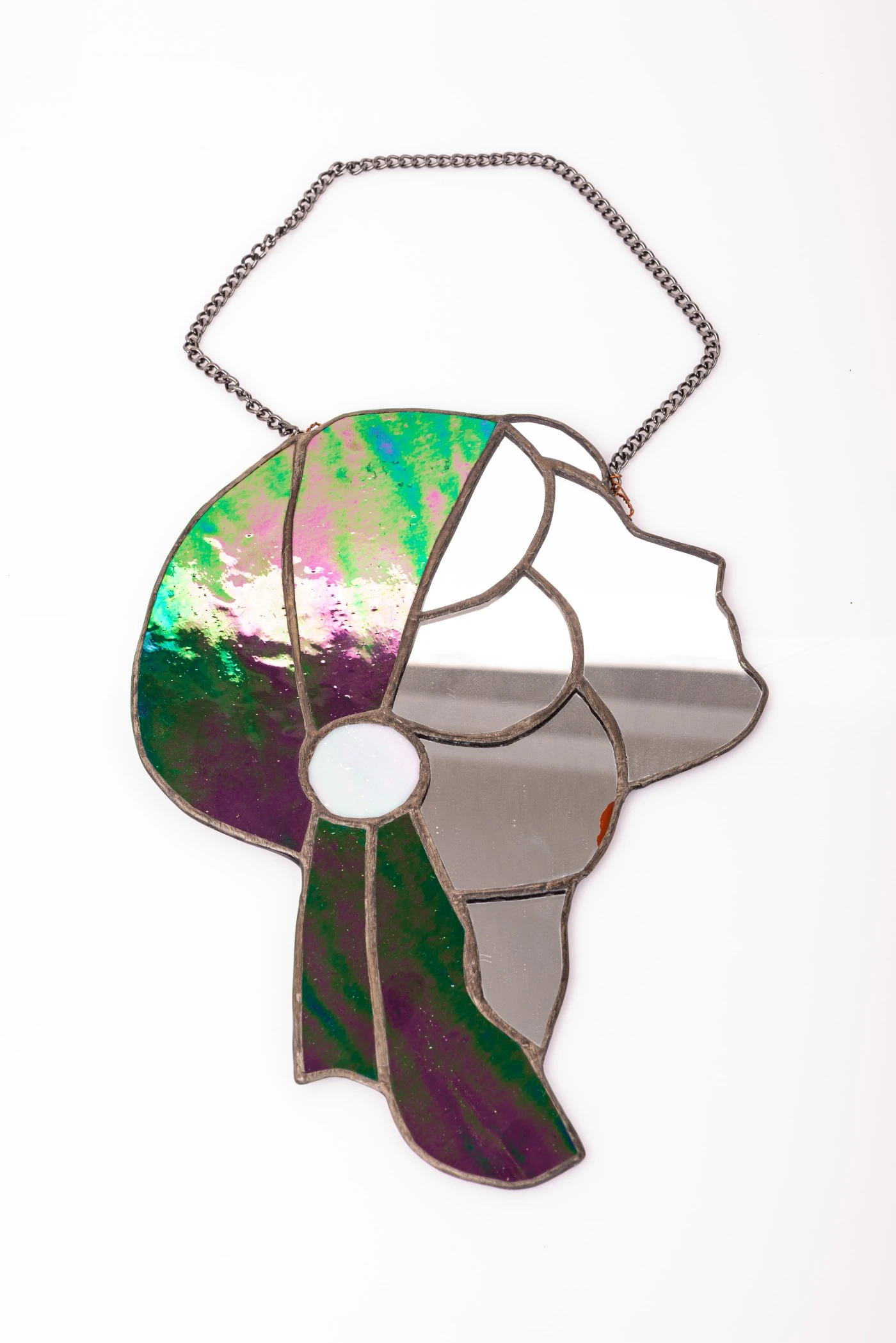 Green stained glass stand with woman’s face mirror