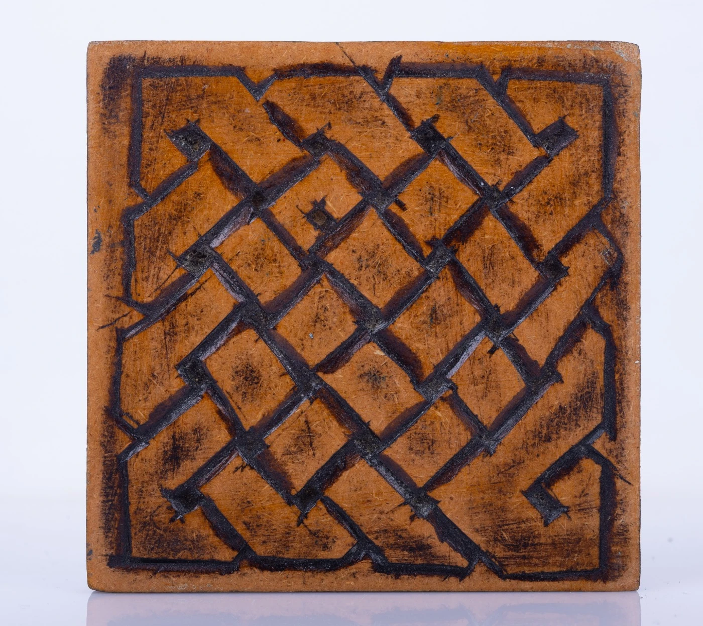 Quadratischer Holzuntersetzer mit kleinen Innenquadraten