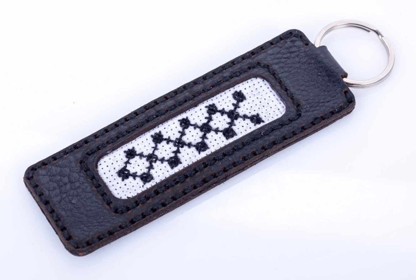 Black & white engraved leather keychain